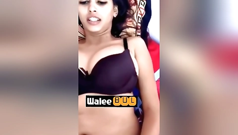Indian brunette with big tits is sucking her man's cock
