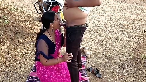Indian brunette playing with a big dick in the jungle
