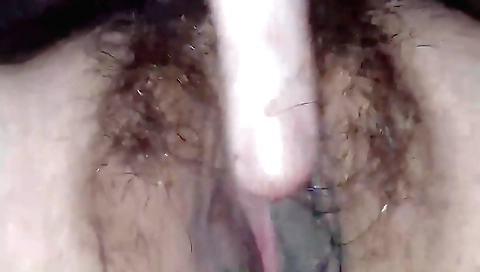 Amateur hairy girl is on the bed and she is fucking