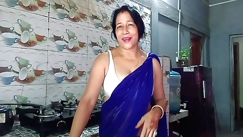 Hot indian female in sexy clothes plays with her shaved pussy