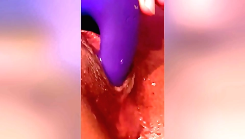 Indian amateur milf sucks a big dildo and masturbates