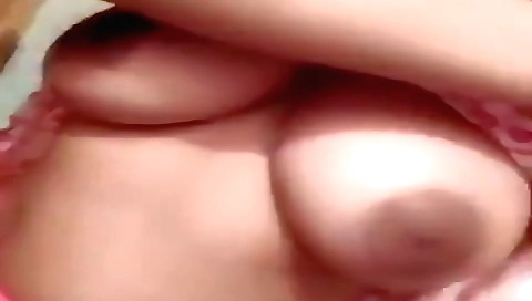 Hot amateur brunette shows off her big boobs in shower
