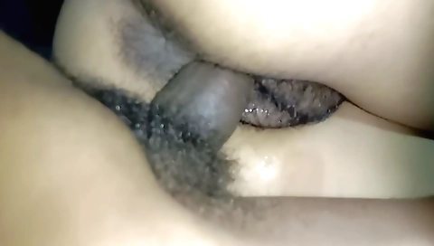 Indian chick with a round booty showing off her hairy pussy