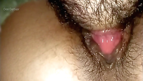 Indian amateur girl with a cute face and short hair is playing