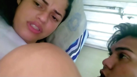 Indian slut wearing pink panties and white skirt in bedroom