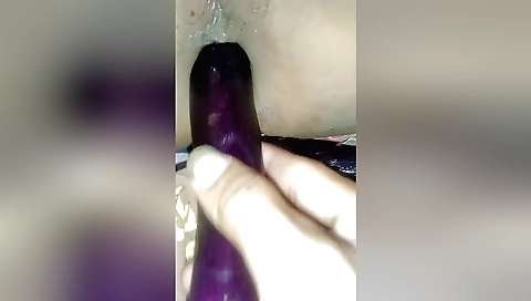 Indian slut with hairy pussy is fucked by a big dildo