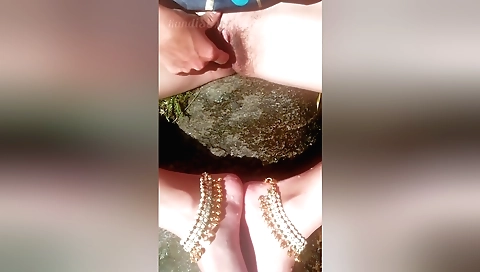 Amateur blonde chick masturbating outdoors in a hot solo vid