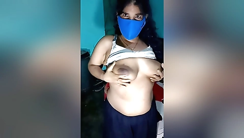 Solo girl in a red shirt and black pants in a homemade video