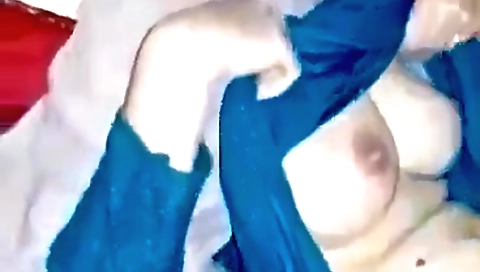 amateur 18+ sex video showing a blonde taking off a shirt
