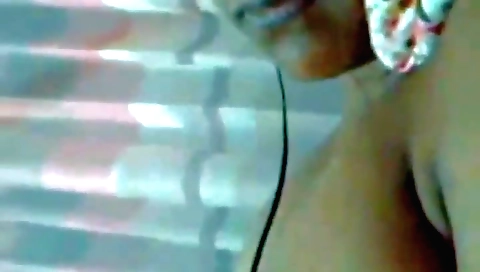 Busty brunette in sexy white dress in homemade webcam