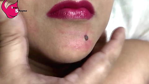 Indian brunette plays with a lollipop and suckles a dick