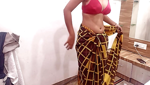 Indian teen in red saree has a great ass and a nice body