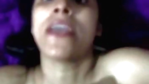 A hairy teen is riding a hard dick on her shaved pussy