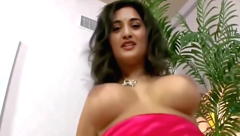 Indian brunette in black dress rides big cock in her mouth