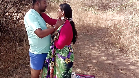 Chatty brunette girl in red saree gets off in the jungle