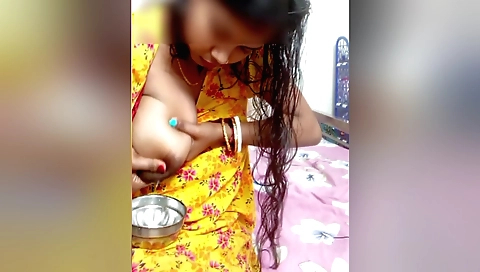 Indian slut with large breasts rubbing her breasts