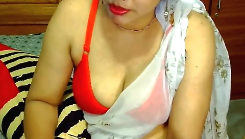 Indian brunette masturbates with a finger and a dildo