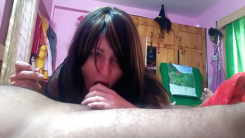 Webcam video of an amateur brunette giving blowjob