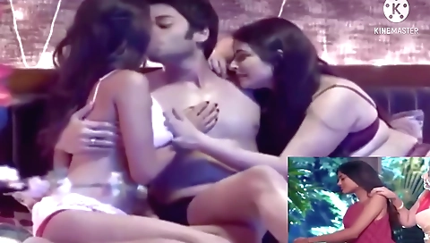 Busty indian milf and her stepdaughter play with a cock